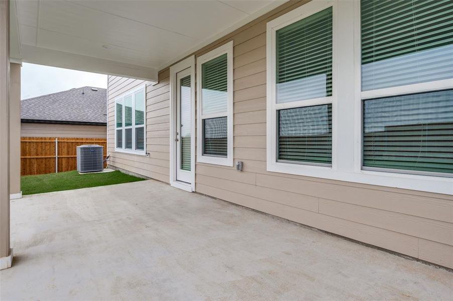 Exterior details and patio area of a home in Eagle Creek, Denton (Image 2). Exterior details and patio area of a home in Eagle Creek, Denton (Image 2).
