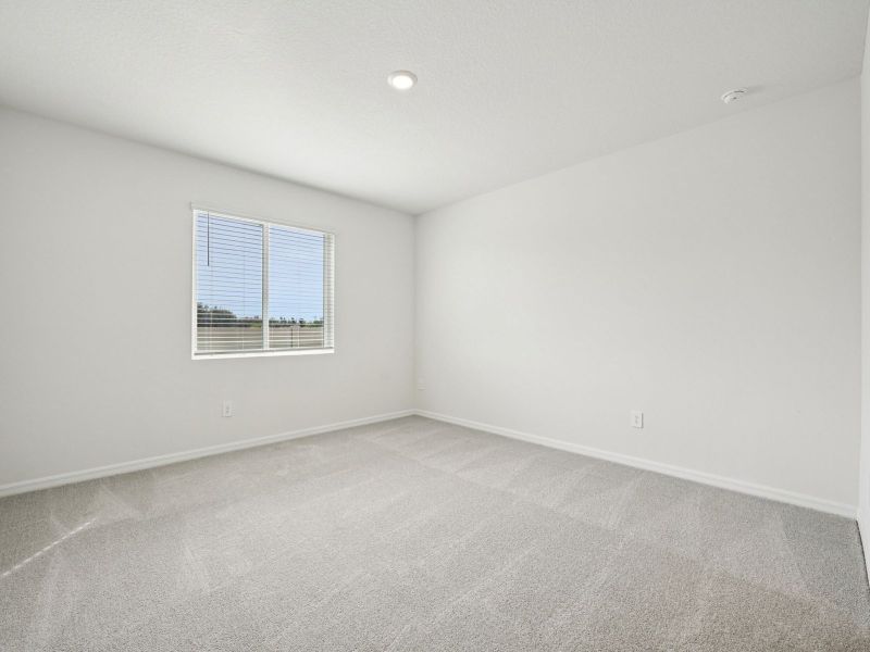 Spacious, unfurnished interior of a new home in Two Rivers - Classic Series, Zephyrhills (Image 12).