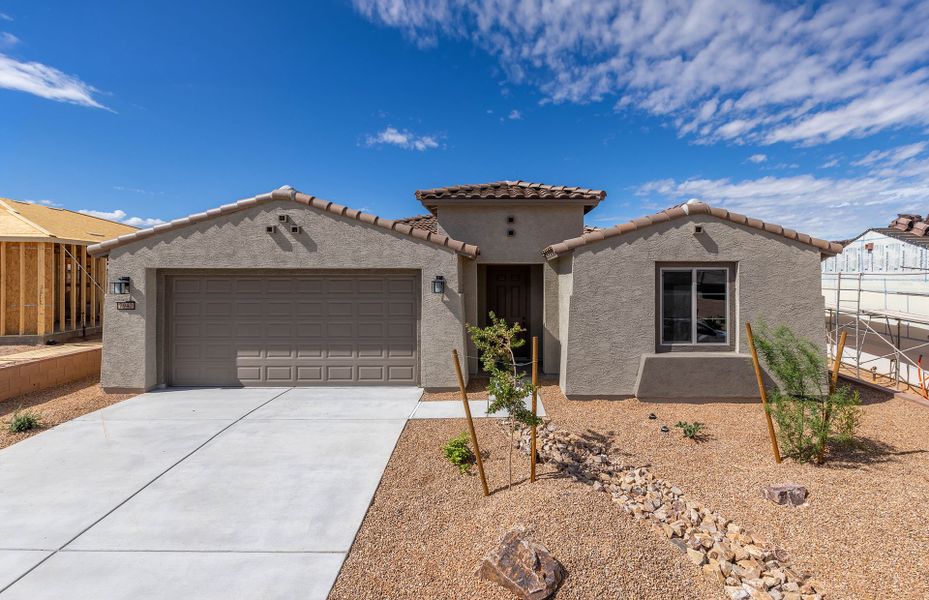 Front exterior of a new home in Del Webb at Rocking K, Tucson, AZ, highlighting curb appeal (Image 2). Front exterior of a new home in Del Webb at Rocking K, Tucson, AZ, highlighting curb appeal (Image 2).