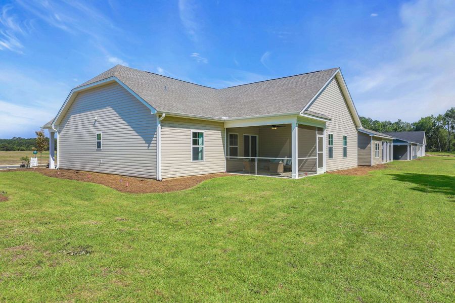 Exterior details and patio area of a home in Beach Gardens, Conway (Image 4).