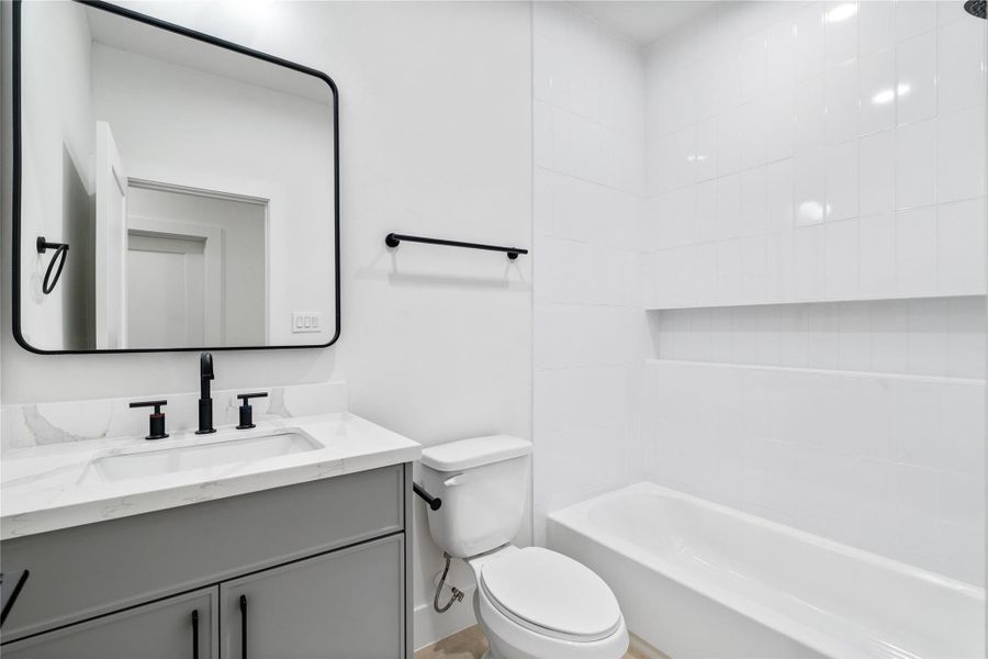 This private bath features high ceilings and ample lighting, creating a bright and spacious feel. This private bath features high ceilings and ample lighting, creating a bright and spacious feel.