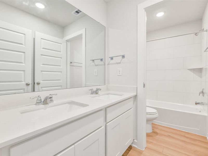Furnished interior view inside a new home in Lakes at Black Oak, Magnolia (Image 10).