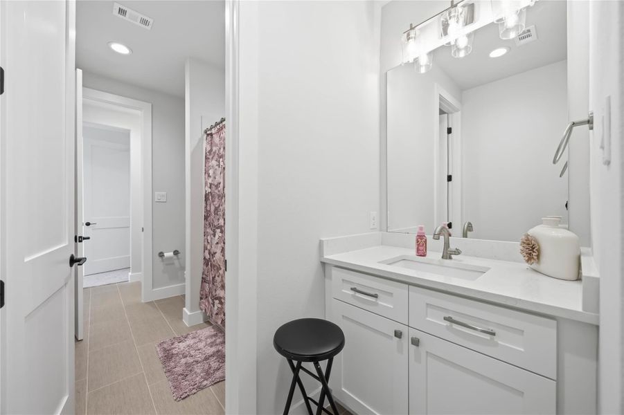 Furnished interior view inside a new home in Artavia, Conroe (Image 39).