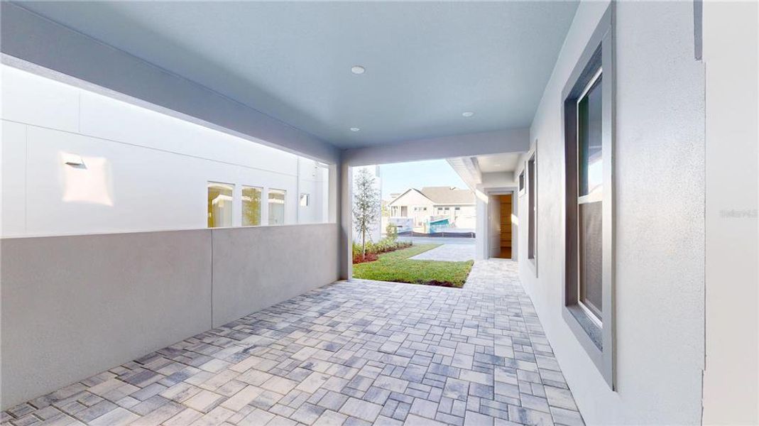 Exterior details and patio area of a home in Laureate Park, Orlando (Image 14).