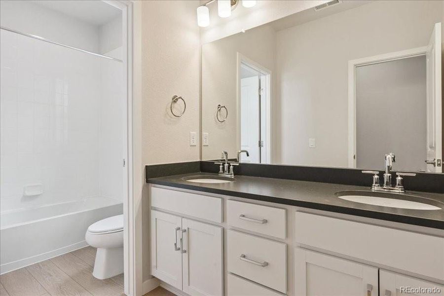 Furnished interior view inside a new home in Trails at Smoky Hill, Parker (Image 7).