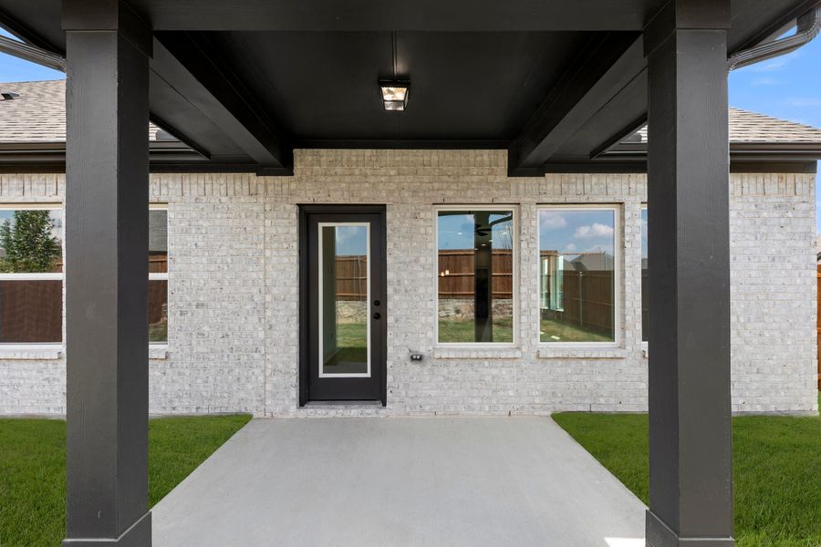 Exterior details and patio area of a home in Walden Pond, Forney (Image 21). Exterior details and patio area of a home in Walden Pond, Forney (Image 21).