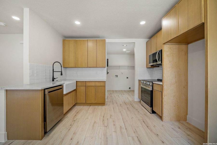 Furnished interior view inside a new home in , San Antonio (Image 12).