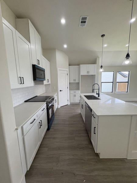 Furnished interior view inside a new home in Stillwater Lake Estates, Godley (Image 5).