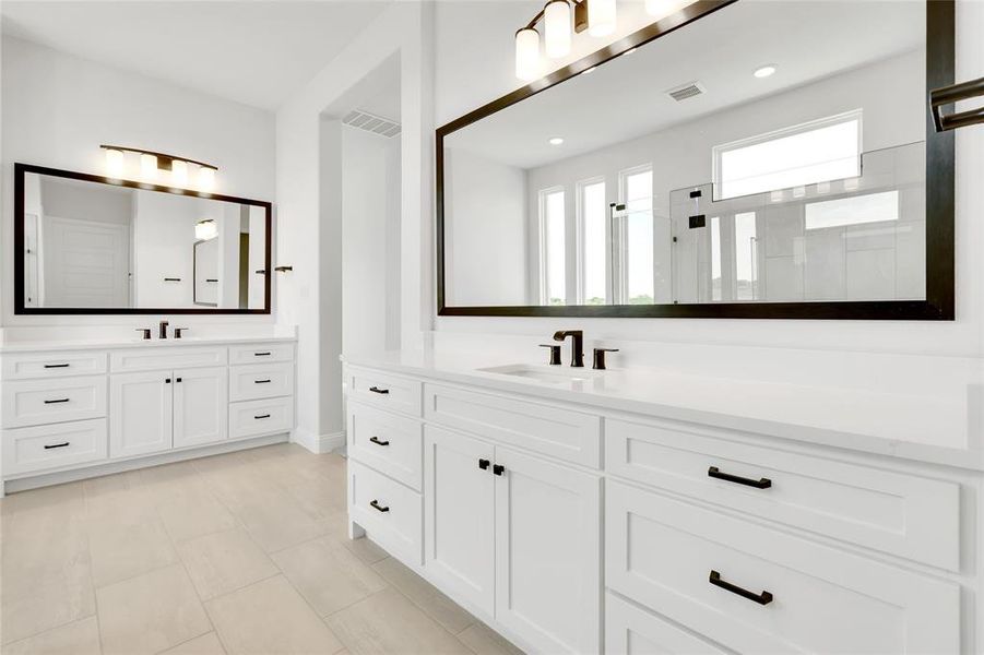 Bathroom with tile floors and vanity