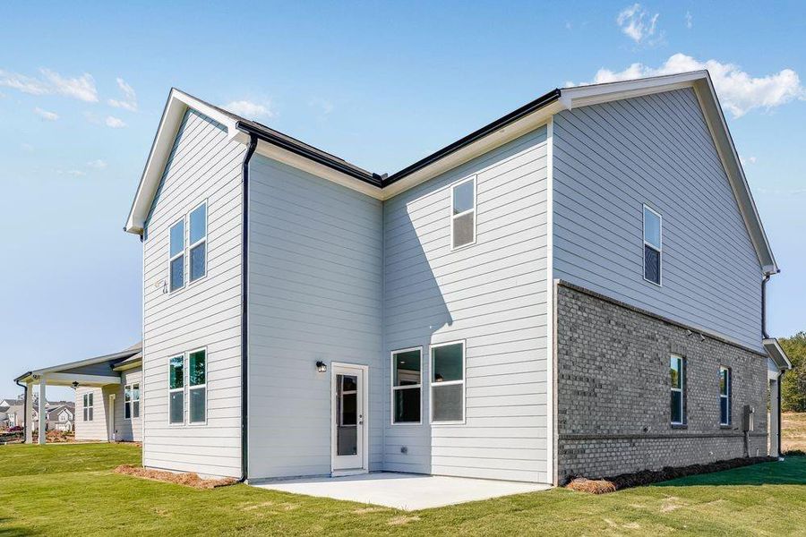 Exterior details and patio area of a home in Windance Lake, Loganville (Image 22).