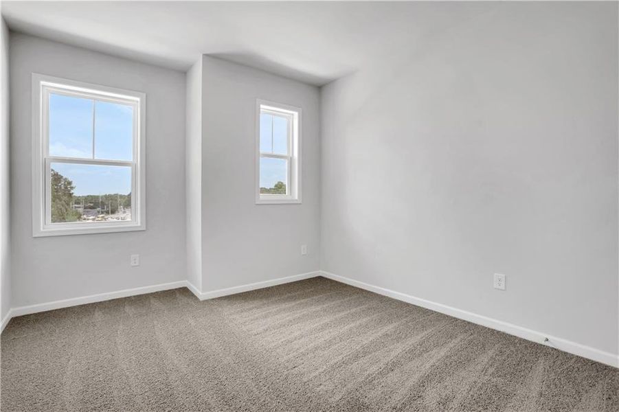 Spacious, unfurnished interior of a new home in Towne Village at Suwanee Dam, Sugar Hill (Image 10).