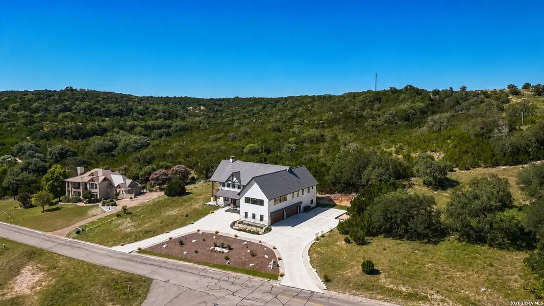 Front exterior of a new home in , Boerne, TX, highlighting curb appeal (Image 1). Front exterior of a new home in , Boerne, TX, highlighting curb appeal (Image 1).