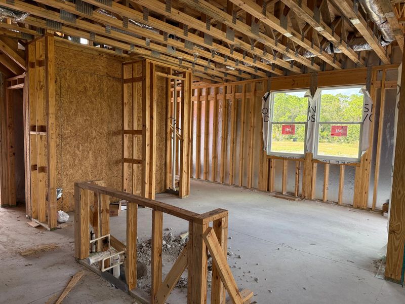 Kitchen faces sun-filled dining space