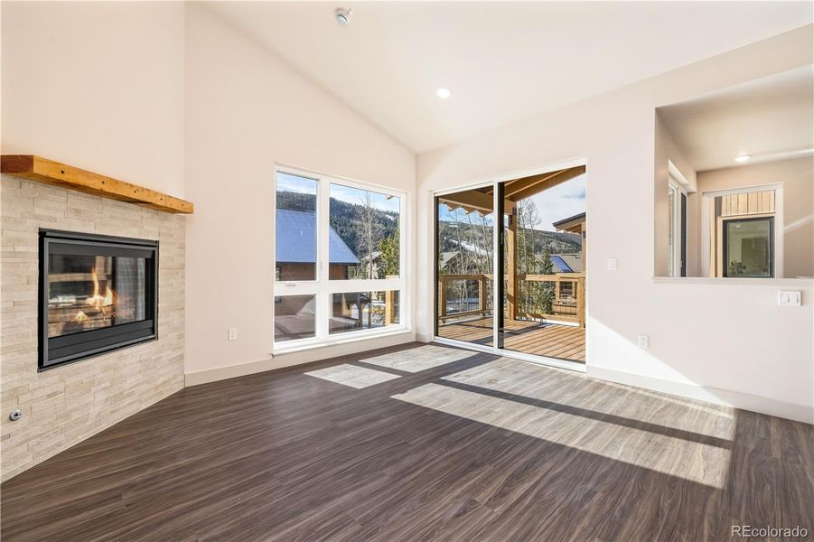 Views of Keystone ski resort from the living area. Please note this unit is still under construction and the mantel will be stained.