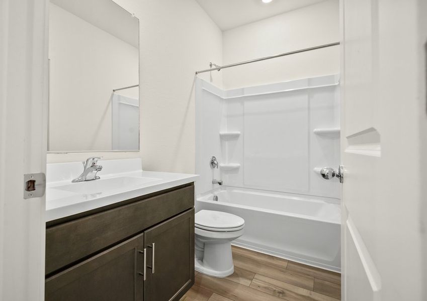 The secondary bathroom is the perfect space for guests to get ready.