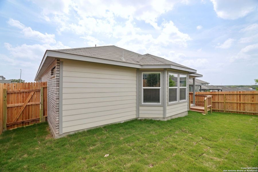 Exterior details and patio area of a home in Thomas Pond, San Antonio (Image 24). Exterior details and patio area of a home in Thomas Pond, San Antonio (Image 24).