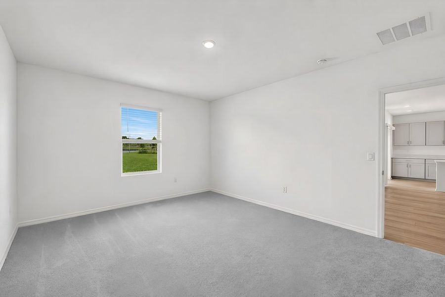 Representative unfurnished interior of a home built from the Goldfinch by Taylor Morrison in Westview Community Group Page, Kissimmee (Image 15).