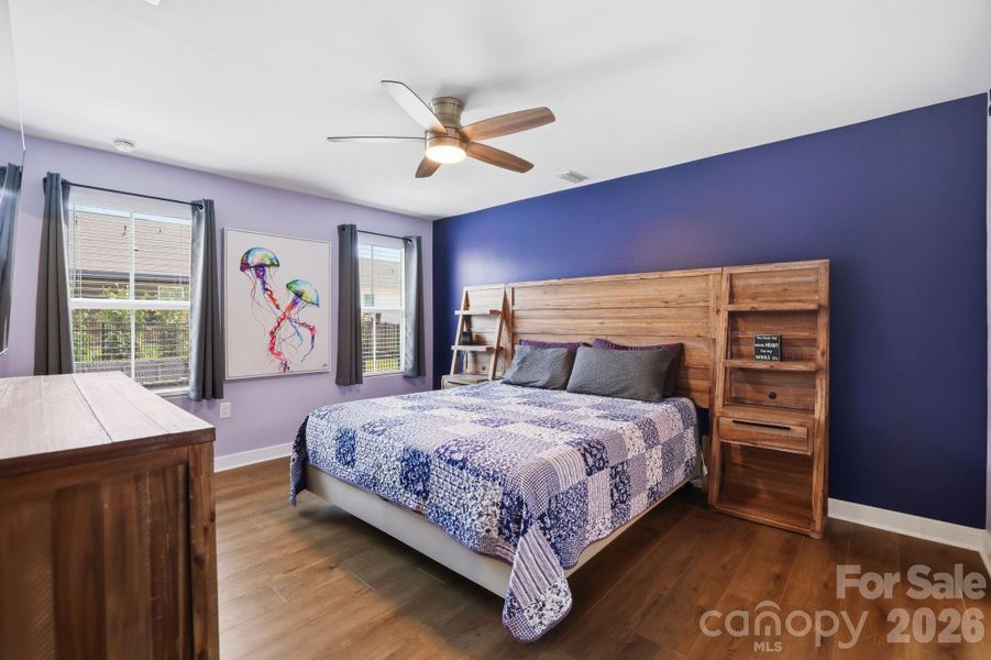 Primary bedroom overlooks rear yard