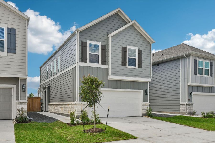 Front exterior of a new home in Parkway Commons - City Series, Missouri City, TX, highlighting curb appeal (Image 26). Front exterior of a new home in Parkway Commons - City Series, Missouri City, TX, highlighting curb appeal (Image 26).