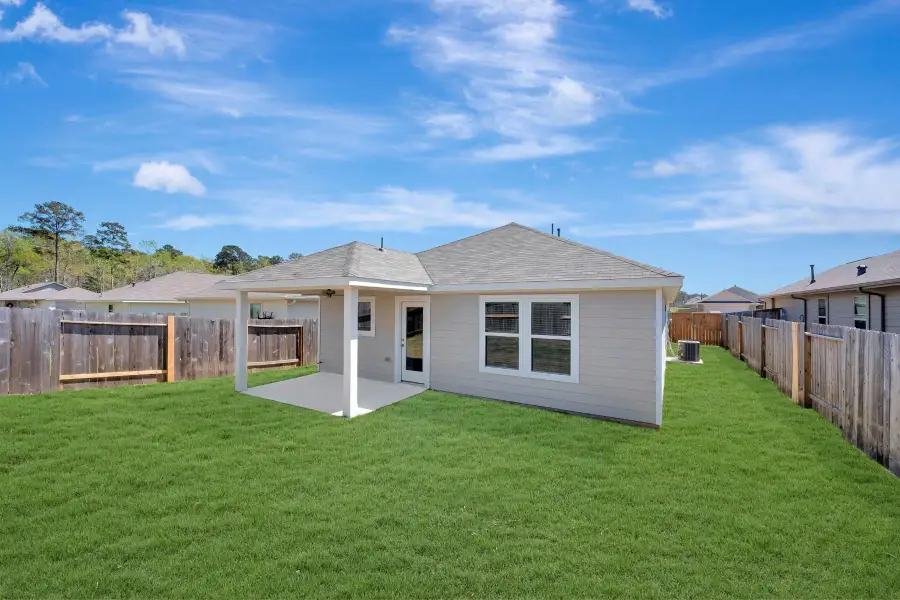Exterior details and patio area of a home in Magnolia Ridge, Magnolia (Image 4).