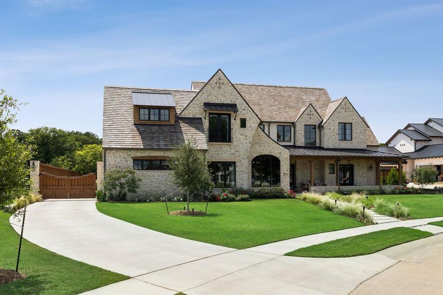 Front exterior of a new home in , Southlake, TX, highlighting curb appeal (Image 23).