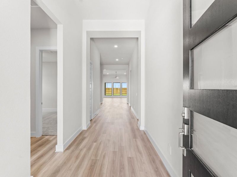 12 Ft. Entry Ceiling and Luxury Vinyl Plank Flooring As You Enter 12 Ft. Entry Ceiling and Luxury Vinyl Plank Flooring As You Enter