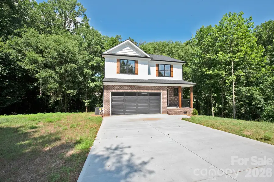 Front exterior of a new home in , Kannapolis, NC, highlighting curb appeal (Image 2). Front exterior of a new home in , Kannapolis, NC, highlighting curb appeal (Image 2).