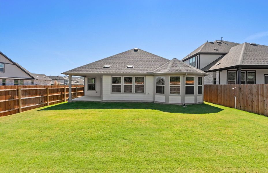 Exterior details and patio area of a home in Saddleback at Santa Rita Ranch, Liberty Hill (Image 23). Exterior details and patio area of a home in Saddleback at Santa Rita Ranch, Liberty Hill (Image 23).