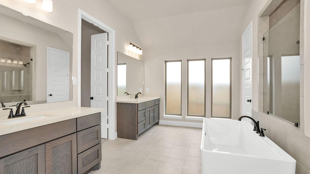 Furnished interior view inside a new home in Elyson 55', Katy (Image 9).