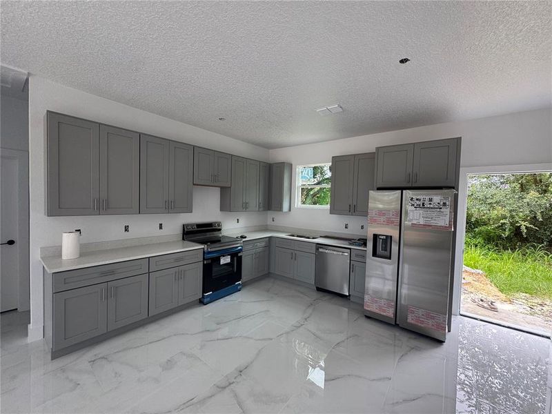 Furnished interior view inside a new home in , Winter Garden (Image 9).