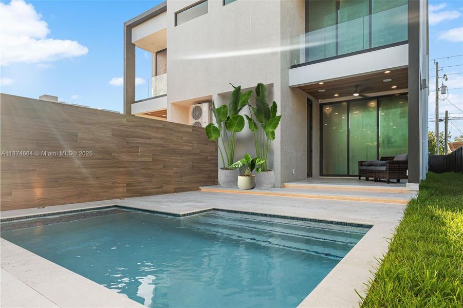 Exterior details and patio area of a home in , Miami (Image 16). Exterior details and patio area of a home in , Miami (Image 16).