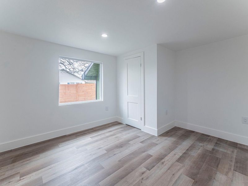 Spare room with recessed lighting and light wood-style floors