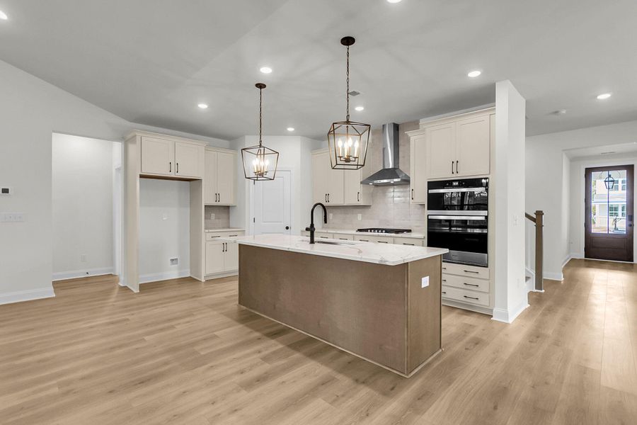 Furnished interior view inside a new home in Tidewater at Lakes of Cane Bay, Summerville (Image 7).