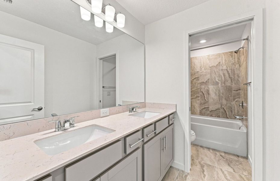 Furnished interior view inside a new home in Seaire, Parrish (Image 8).