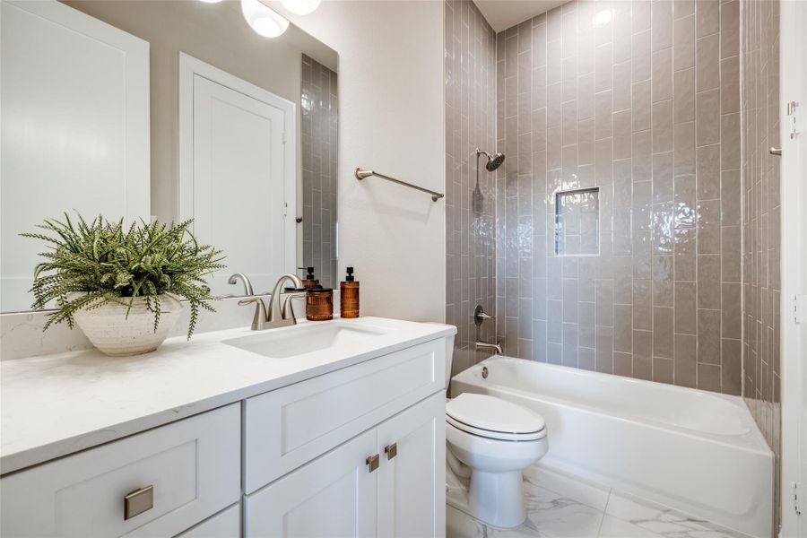 Representative photo of the Secondary Bedroom with Ensuite Bath