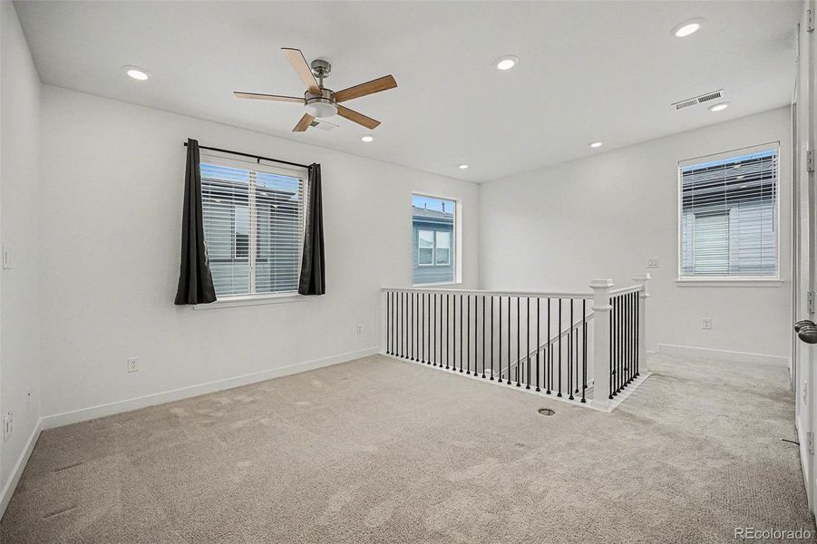 Spacious, unfurnished interior of a new home in Red Rocks Ranch, Morrison (Image 24).