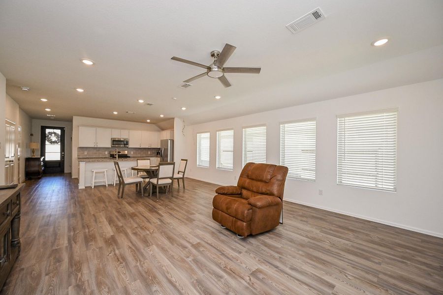 Step into a thoughtfully designed open-concept living space that harmonizes functionality with contemporary elegance. The room integrates the kitchen, dining, and living areas into a cohesive layout, ideal for both everyday living and entertaining. Step into a thoughtfully designed open-concept living space that harmonizes functionality with contemporary elegance. The room integrates the kitchen, dining, and living areas into a cohesive layout, ideal for both everyday living and entertaining.