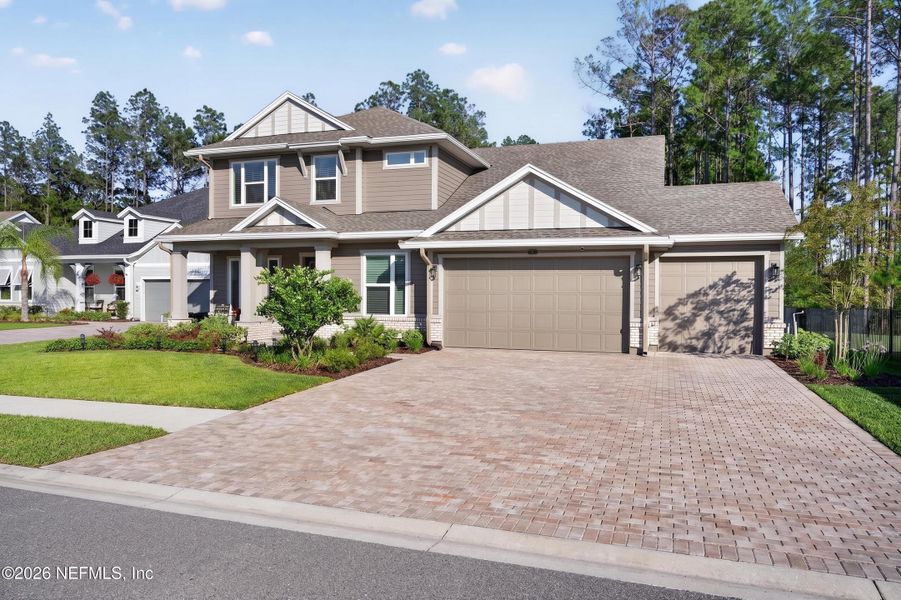 Front exterior of a new home in , St. Johns, FL, highlighting curb appeal (Image 29).