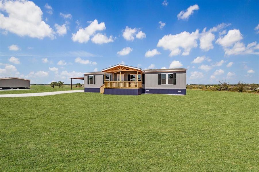 Exterior details and patio area of a home in , Poolville (Image 2). Exterior details and patio area of a home in , Poolville (Image 2).