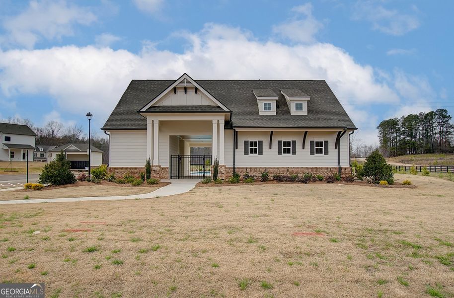 Front exterior of a new home in Ponderosa Farms Manor, Gainesville, GA, highlighting curb appeal (Image 23).