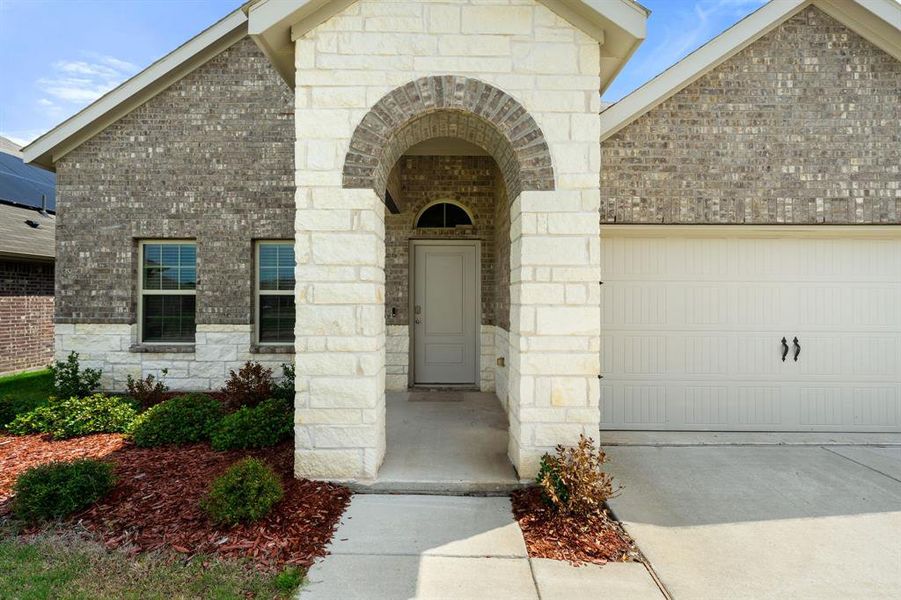 Exterior details and patio area of a home in Stonehaven, Caddo Mills (Image 21).