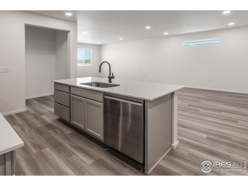 KITCHEN OPEN TO DINING AND LIVING