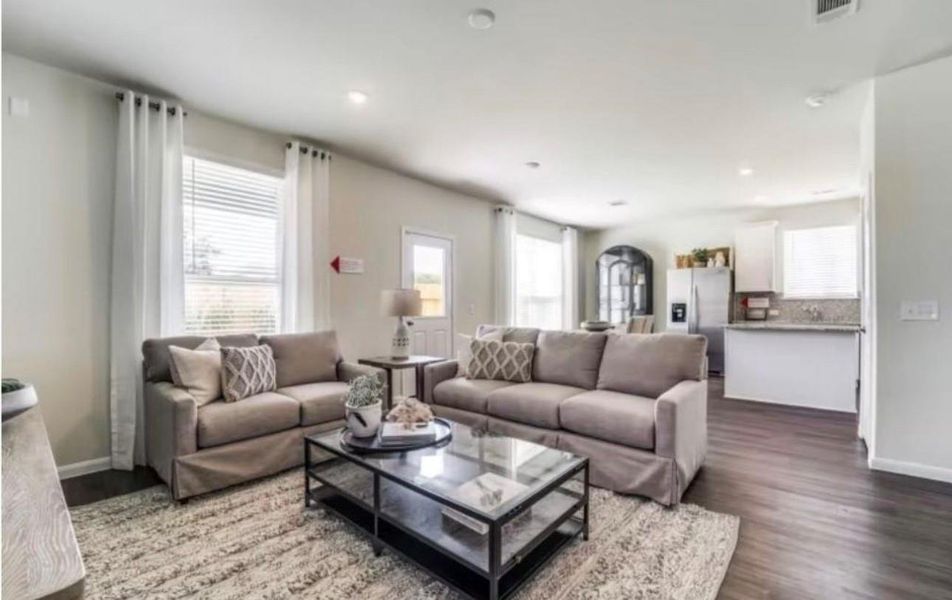 Furnished interior view inside a new home in The Pines At Seven Coves, Conroe (Image 6).