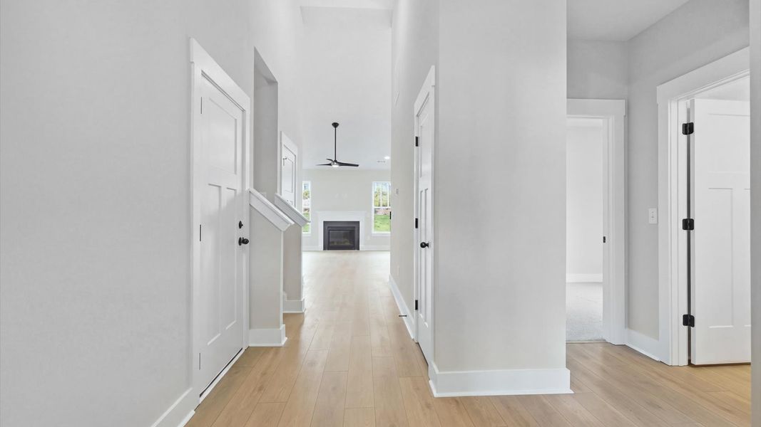 Eye-catching entry with hardwood flooring and a bright, inviting atmosphere