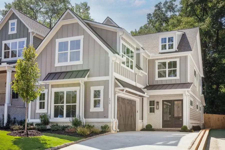 Front exterior of a new home in , Marietta, GA, highlighting curb appeal (Image 1).