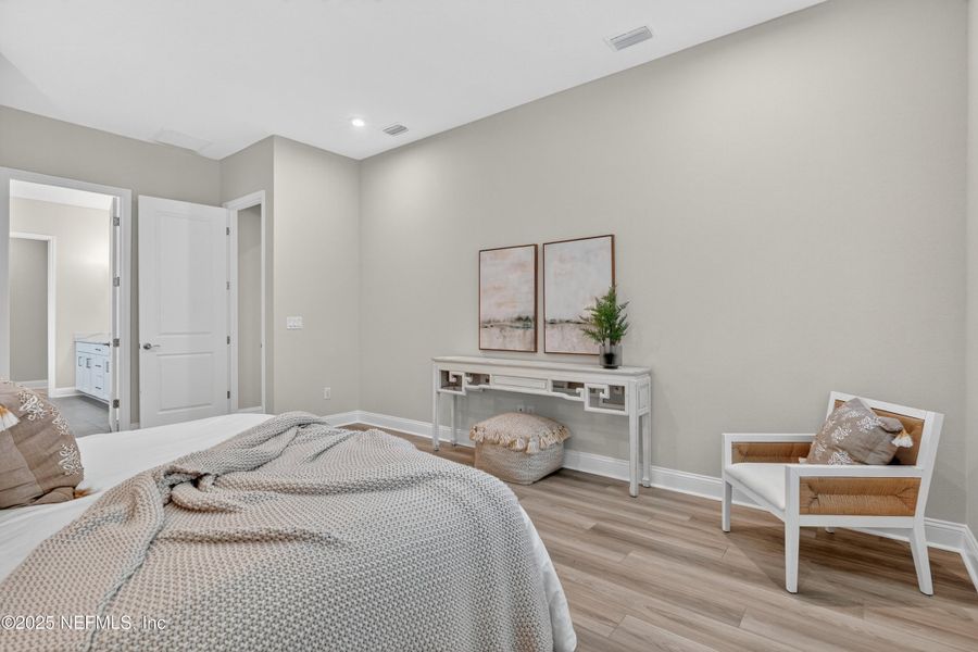 Furnished interior view inside a new home in RiverTown - WaterSong, St. Johns (Image 9).