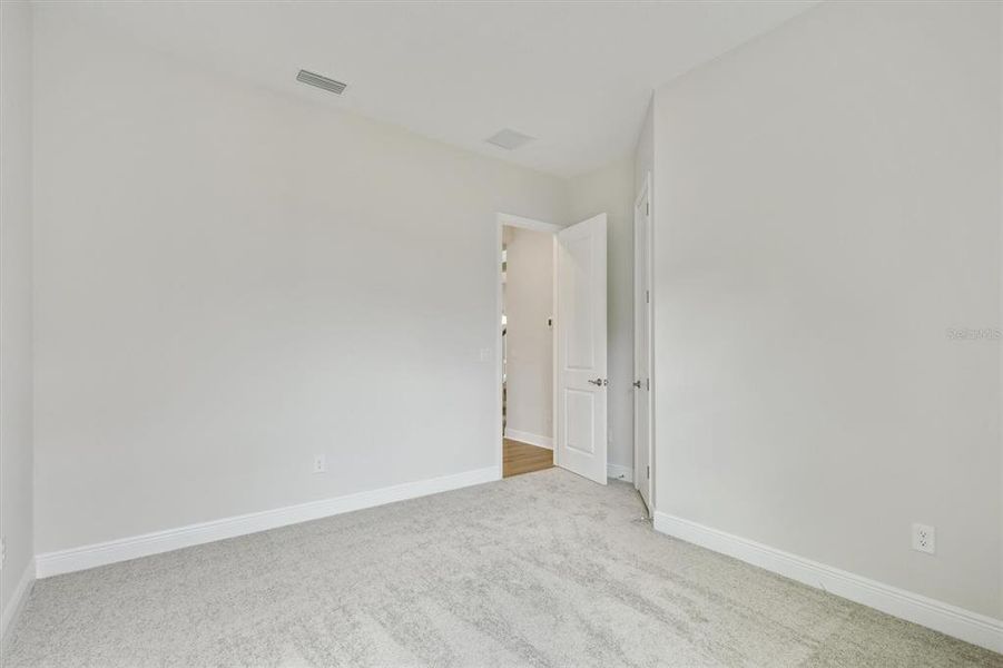 Spacious, unfurnished interior of a new home in Hidden Lakes, Brandon (Image 14).