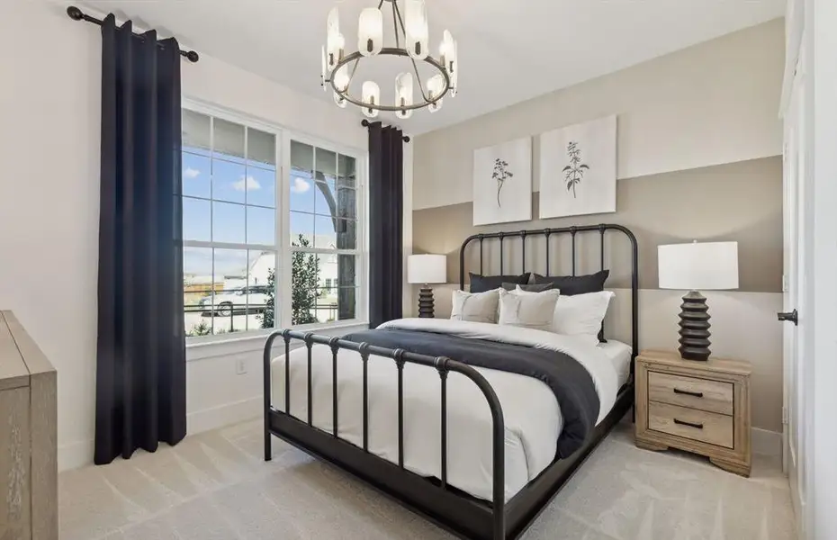 *Model Representation - Spacious secondary bedroom with large windows