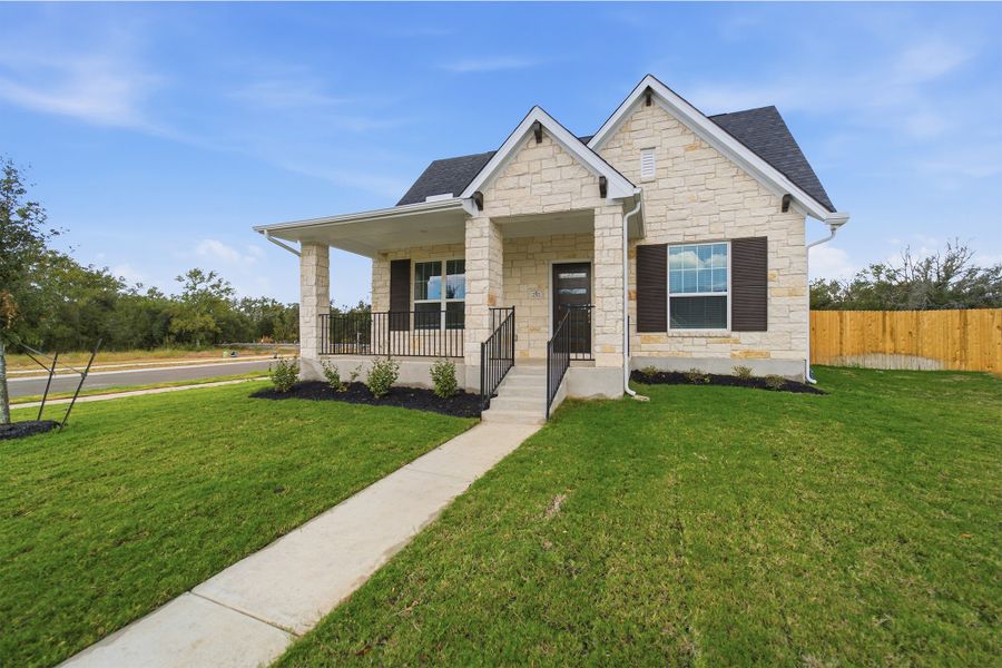 Front exterior of a new home in Sanctuary, Salado, TX, highlighting curb appeal (Image 2).