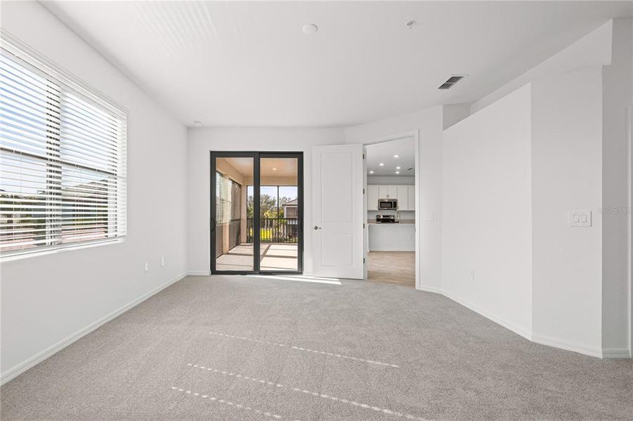 Spacious, unfurnished interior of a new home in Legends Cove, Bradenton (Image 18).